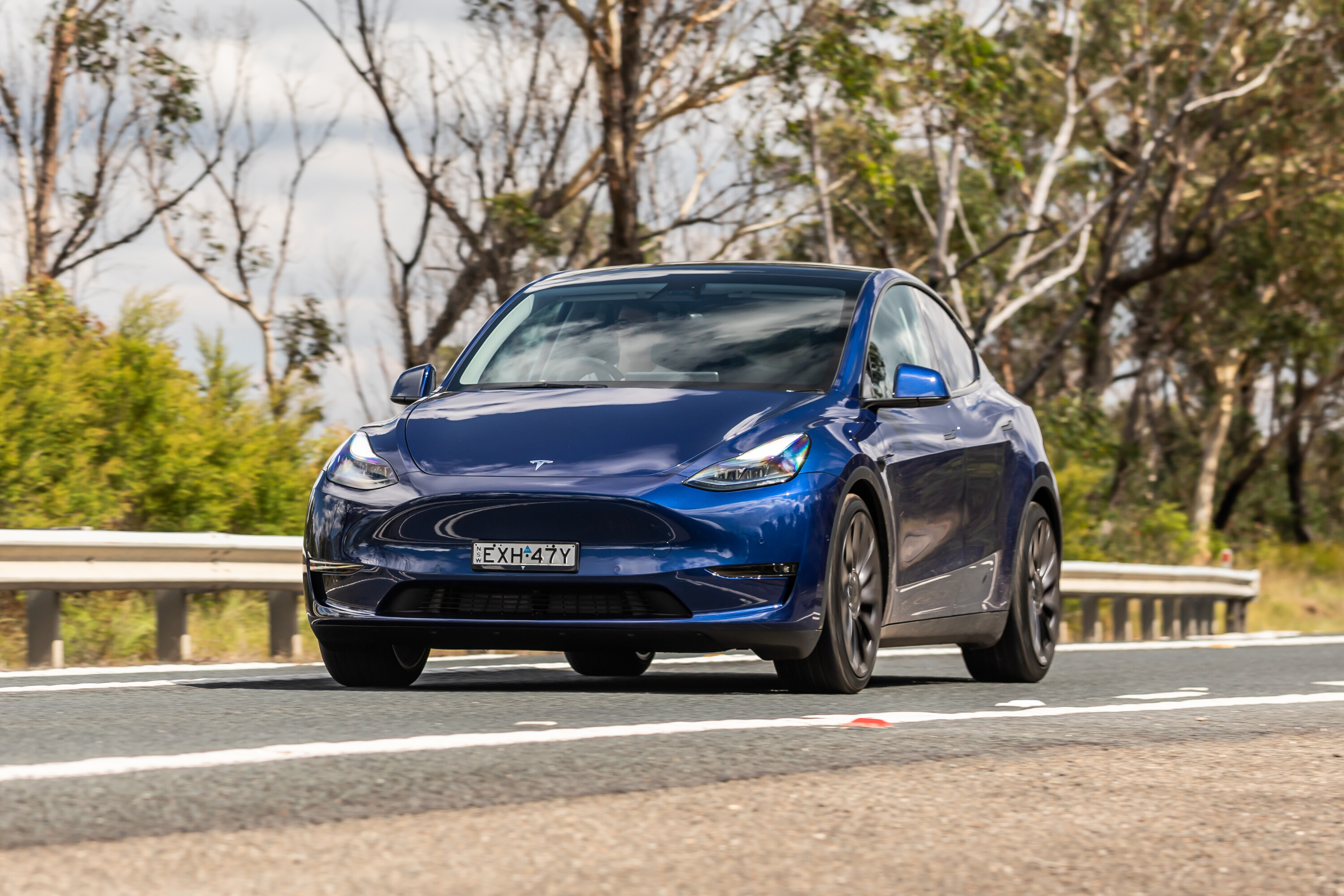 e9cb872a/2023 tesla model y performance suv blue 6 jpg
